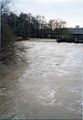 Hochwasser der <a class="mw-selflink selflink">Rednitz</a> mit Blick auf das Stauwehr der abgerissenen <!--LINK'" 0:378--> im Februar 1981