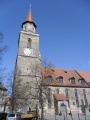 Ansicht von Süden auf den Turm und einen Teil des Kirchenschiffes von <!--LINK'" 0:308--> am Kirchenplatz