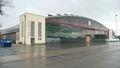 Südl. ehemaliger Hangar am früheren <!--LINK'" 0:53--> Bj. ca. 1935 jetzt modern umgebauter Firmensitz im <a class="mw-selflink selflink">Golfpark Fürth</a>, 2010