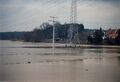 Hochwasser bei , Blick in den überschwemmten Wiesengrund im Hintergrund , Feb. 1987