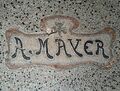 Boden-Monogramm in Terazzo des Bauherrn "A. Mayer" (<!--LINK'" 0:7--> (1869-1933), u.a. Gastwirt der <!--LINK'" 0:8-->, Bruder von <!--LINK'" 0:9-->)