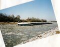  Kanal mit Eisschollen in <a class="mw-selflink selflink">Vach</a>, im Hintergrund die Hüttendorfer Brücke im Februar 2003