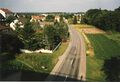 Blick von der <!--LINK'" 0:11--> auf die <a class="mw-selflink selflink">Obermichelbacher Straße</a> in <!--LINK'" 0:12-->, rechts Talgrund vom <!--LINK'" 0:13--> im Juli 1997