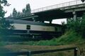 Straßenbrücke der Theodor-Heuss-Straße über die kreuzende Eisenbahn, 1987 <span class="smw-highlighter" data-type="8" data-state="inline" data-title="Hinweis" title="Urheber: Bernd JesussekErstellungsdatum: 5. September 1987Lizenz: cc-by-sa-3.0"><span class="smwtticon note"></span><span class="smwttcontent">Urheber: <!--LINK'" 0:143--><br>Erstellungsdatum: <!--LINK'" 0:144--> <!--LINK'" 0:145--><br>Lizenz: cc-by-sa-3.0</span></span>