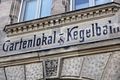 alte Fassadenbeschriftung über dem Hauseingang Anwesen <!--LINK'" 0:55--> im Juni 2020 der früheren hier befindlichen Gaststätte (Stadt Bamberg). Im Adressbuch 1931 ist der Wirt Hermann Kühn, wohnhaft im 1. Stock, aufgeführt.