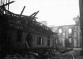 Die jüd. Synagoge nach der Pogromnacht vom 9. auf den 10. November 1938; auf der linken Seite die niedergebrannte <!--LINK'" 0:94--> oder <!--LINK'" 0:95--> und dahinter die Ruine der Hauptsynagoge, der <!--LINK'" 0:96-->.
