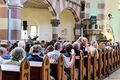 Gottesdienst in der Kirche St. Paul mittel einer KI auf der Leinwand während des Evang. Kirchentags - die Teilnehmer nehmen den Gottesdienst mit dem Handy auf, Juni 2023