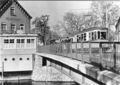 Postkarte von 2003 mit Ansicht von 1953 der <a class="mw-selflink selflink">Maxbrücke</a>, der längst abgerissenen Gaststätte <!--LINK'" 0:153--> und einer von der <!--LINK'" 0:154--> kommenden Straßenbahn Typ 907 Bj. 1940