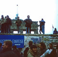 <a class="mw-selflink selflink">Alexander Mayer</a> (Mitte, mit Bart) auf der Berliner Mauer, Dezember 1989