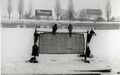 Jagdfalken-Präsentation im Fußballstadion Ronhof - im Hintergrund Werbung örtlicher Gewerbetreibender, Feb. 1968