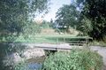 Neben der Mühltalstraße überquert eine Wegbrücke den Farrnbach (1992) <span class="smw-highlighter" data-type="8" data-state="inline" data-title="Hinweis" title="Urheber: Bernd JesussekLizenz: CC BY-SA 4.0"><span class="smwtticon note"></span><span class="smwttcontent">Urheber: <!--LINK'" 0:33--><br><br>Lizenz: CC BY-SA 4.0</span></span>