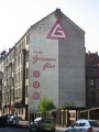 Gemalte Reklame der <a class="mw-selflink selflink">Brauerei Geismann</a> auf dem Gebäude Holzstraße 45, 2000