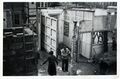 Blick in die Werkstatt von Reifen-Reichel in der Langen Straße bei Abrissarbeiten, 1953